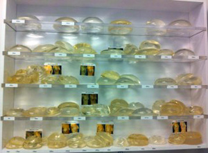 A display filled with different types of breast implants.