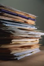 A stack of incomplete case files.