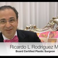 Dr. Ricardo L. Rodriguez sitting in a chair.