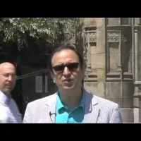 Dr. Ricardo L. Rodriguez standing in front of Yale University.