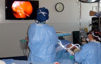 Dr. Ricardo L. Rodriguez performing an endoscopic brow lift procedure.