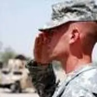 A soldier saluting