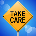 A yellow square road sign with the text:"Take care".